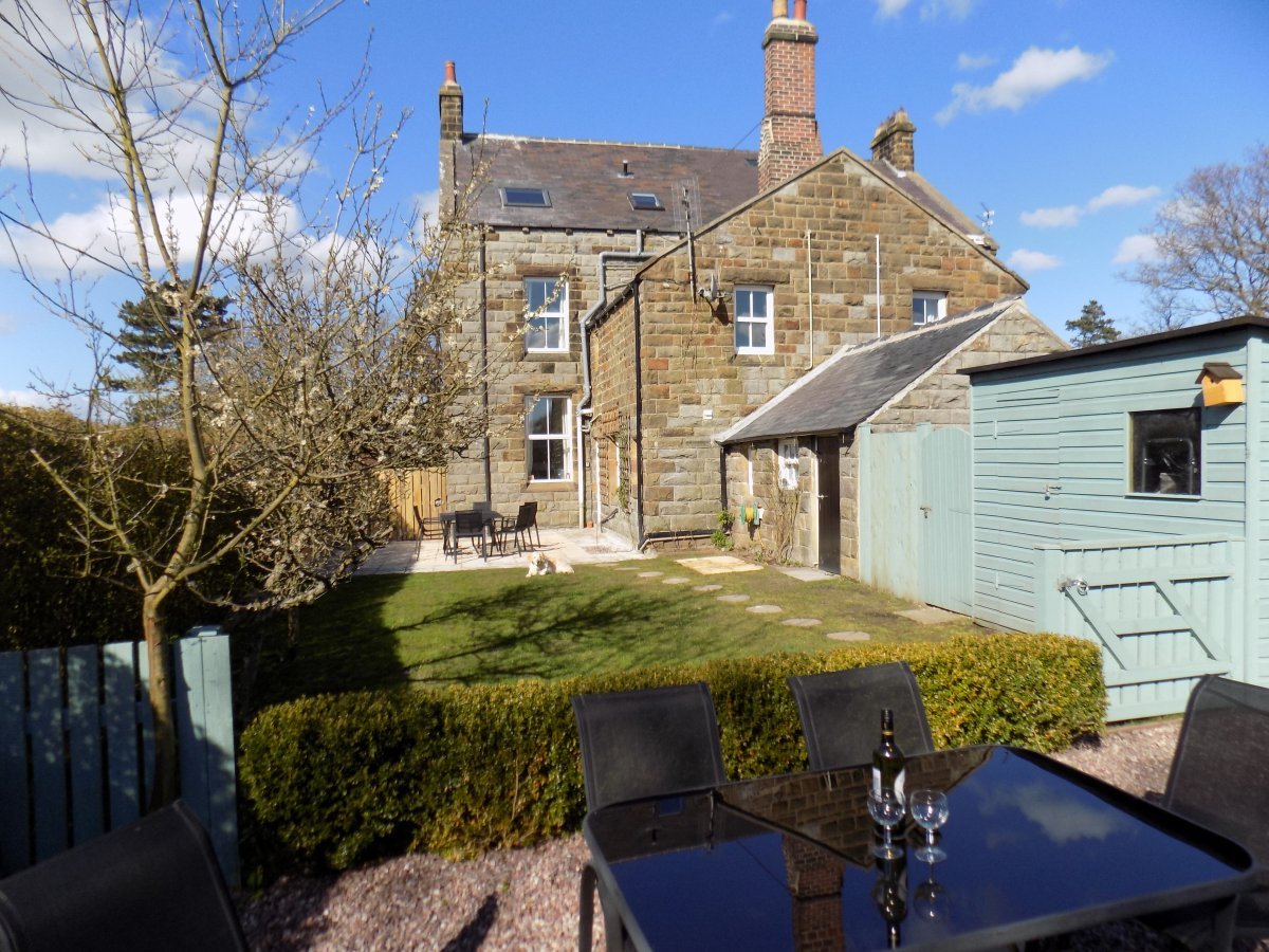Helena - back garden, secure for dogs and children with a BBQ and seating area